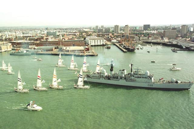 Flashback - HMS Glasgow leading the Clipper Round The World Yacht fleet at the start of the 2000 race off Portsmouth. Picture by Peter Bentley
