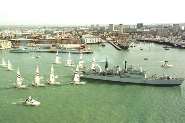 Flashback - HMS Glasgow leading the Clipper Round The World Yacht fleet at the start  of the 2000 race off  Portsmouth. Picture by Peter Bentley