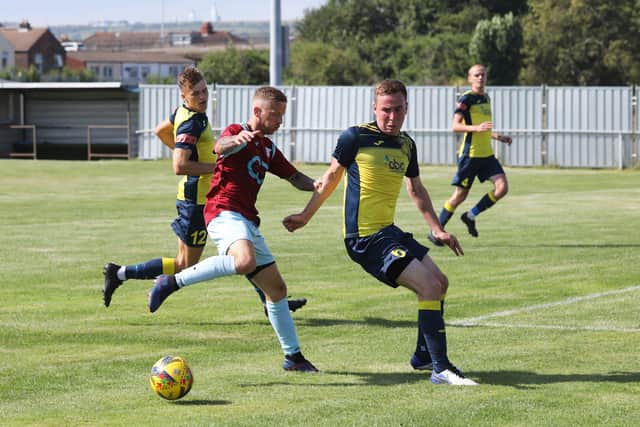 Moneyfields defender Tom Cain, right, in action against Westfields. Picture: Sam Stephenson