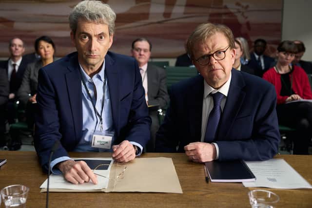 Nick Davies (David Tennant) and Alan Rusbridger (Toby Jones) face a committee of MPs in the new ITV phone-hacking drama The Hack (Picture: ITV STUDIOS)