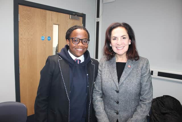 Pupil Tanatswa of St Edmund's Catholic School who is studying GCSE Citizenship and Ms Effie J. Triantafilopoulos MPP from Ontario, Canad