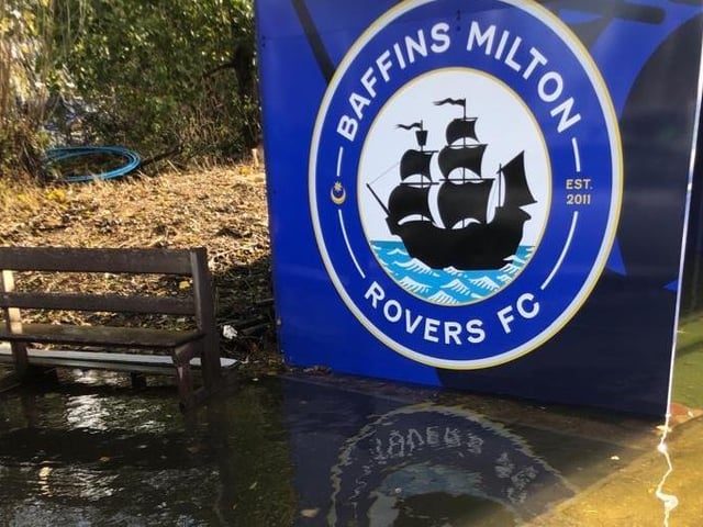 The flooded football ground.