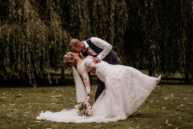 The Tithe Barn, located on Old Ditcham Farm, is an outstanding wedding venue with plenty of photo opportunities throughout.
The venue's website says: 'The Tithe Barn can be the backdrop to the wedding of your dreams.'
Pictured: Amy and Craig Hughes after tying the knot at The Tithe Barn, Petersfield.