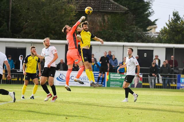 Hereford keeper Paul White punches clear during is side's 3-1 FA Cup win at Gosport. Pic: Tom Phillips