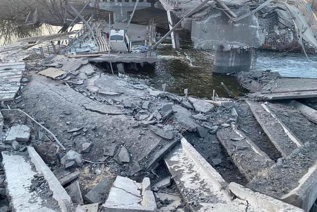 A bridge was devastated by a Russia artillery strike near Kyiv as civilians were reportedly trying to flee the city, claims a veteran British Army sniper in the country.