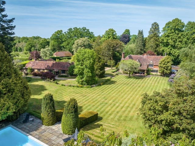 This beautiful home comes equipped with over 11 acres of land, a swimming pool and a tennis court as well as six bedrooms, five bathrooms and seven receptions.