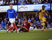 Ronan Curtis scores Pompey's winner against Lincoln after Imps keeper Jordan Wright's failure to hold on to Sean Raggett's effort from the edge of the box    Picture: Barry Zee