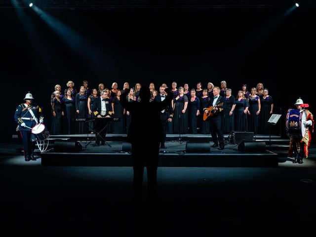 HMS Prince of Wales played host to The Sky’s the Limit Ball, a fundraising event for the Royal Navy and Royal Marines Charity (RNRMC). Picture: Little Red Ambulance and Military Wives Choir