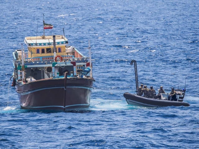 Royal Marine Boarding team conducting the boarding on the contact of interest - Portsmouth-based Type 45 destroyer seized £15m worth of drugs from smugglers operating in the Indian Ocean.