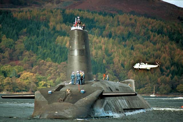 CND protest as Trident submarine, Vanguard, enters the Clyde on it's way to Faslane.