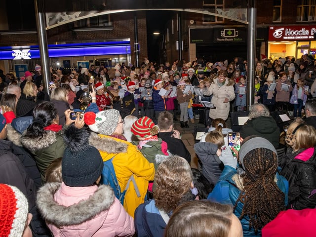Large crowds gathered to see the school children sing Christmas carols.  Photos by Alex Shute