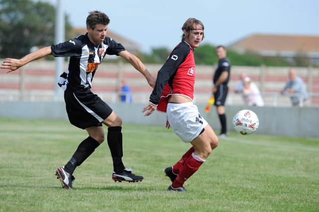 Fareham's Bryn McKie, right, with Hayling United's Ryan Gadd. Picture: Ian Hargreaves
