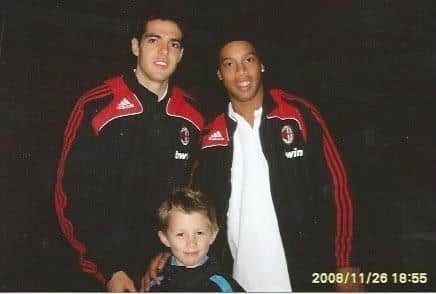 Alfie Stanley meets Kaka and Ronaldinho during AC Milan's visit to Fratton Park in November 2008