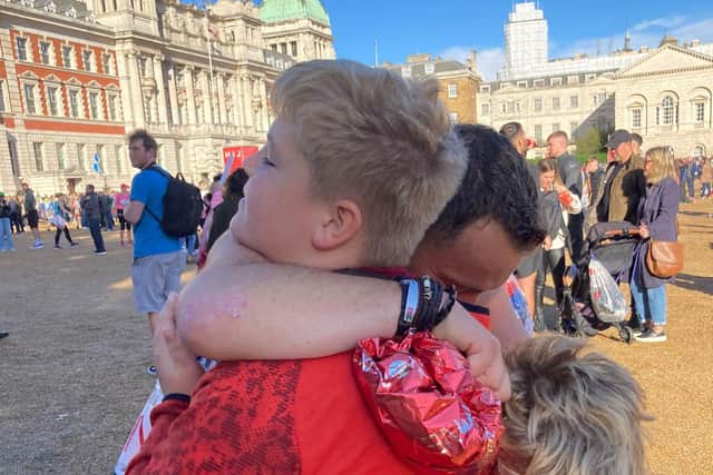 Simon Scott-Munden, 46, ran the London Marathon. Pictured with his sons Theo and Blake. 