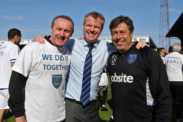 First-team coach Alan McLoughlin celebrating with Pompey caretaker boss Andy Awford and coach Paul Hardyman in May 2014 after keeping Pompey in the Football League. Picture: Joe Pepler
