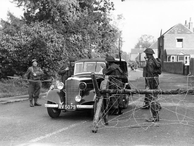 Members of the Home Guard man a checkpoint locally. The News Portsmouth PP236