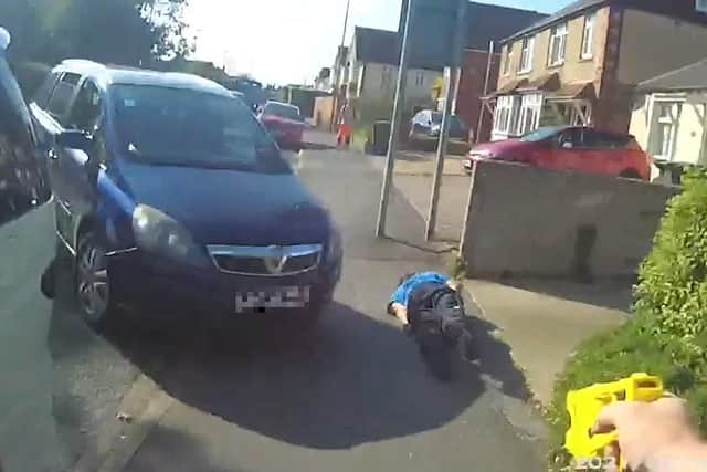 Matthew Wagstaff is detained by police with the use of a Taser in Privett Road, Gosport, on September 16, 2021: Picture: CPS Wessex