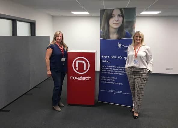 Maureen Webster, HR assistant at Novatech, with Joanne Silsbury, corporate liaison officer at Solent Mind 