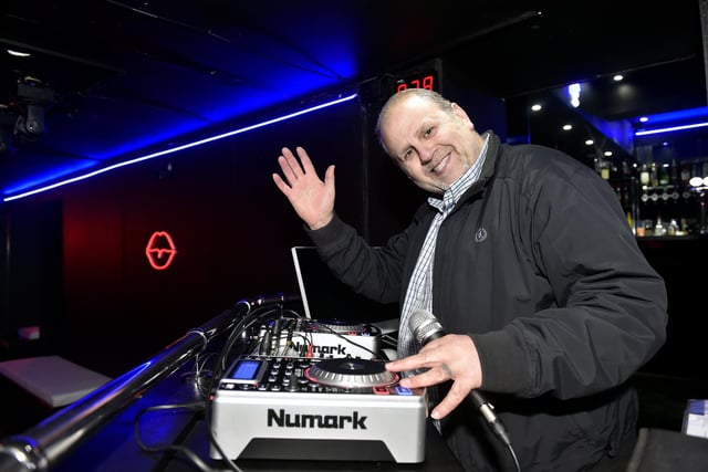 DJ Arthur B behind the turntables.