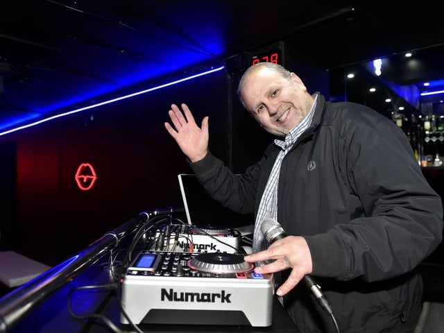 DJ Arthur B behind the turntables.