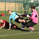 Burrfields striker Jack Palmer challenges the Horndean keeper. Picture by Kevin Shipp