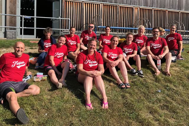 Trojan swimmers outside the Mountbatten Centre. Back (from left): Helen Andrews, Annie Trotman, Tony Corben, Jo Corben, Claire Tagg, Caroline McCulloch. Front: Ashley Rodger, Natalie Rodger, Krystie Rodger, Steph Baron, Sophie Hutin, Mark Franklin