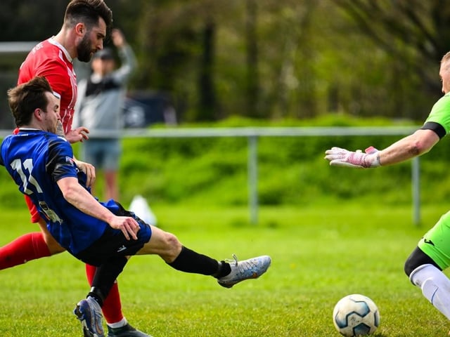 Alex Bartlett puts Clanfield 2-1 up. Picture by Richard Murray