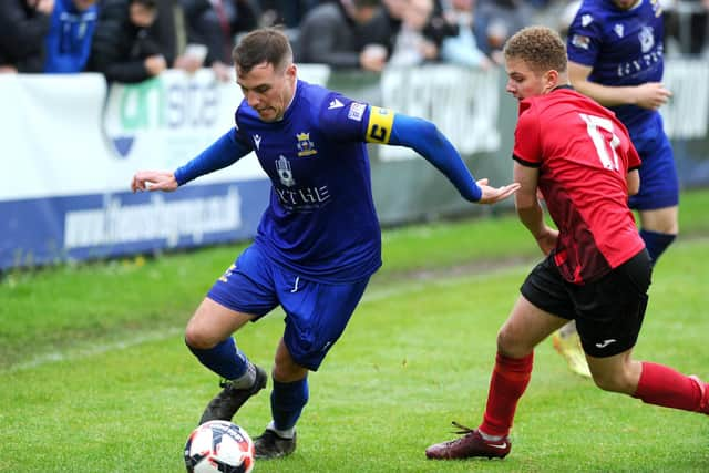 Baffins Milton Rovers captain Jason Parish, left Picture: Sarah Standing