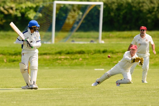Portsmouth Community batter Ninad Gokhale watches the ball go through to Fareham & Crofton 3rds wicket-keeper Adrian Chesney. Picture: Keith Woodland (270521-23)