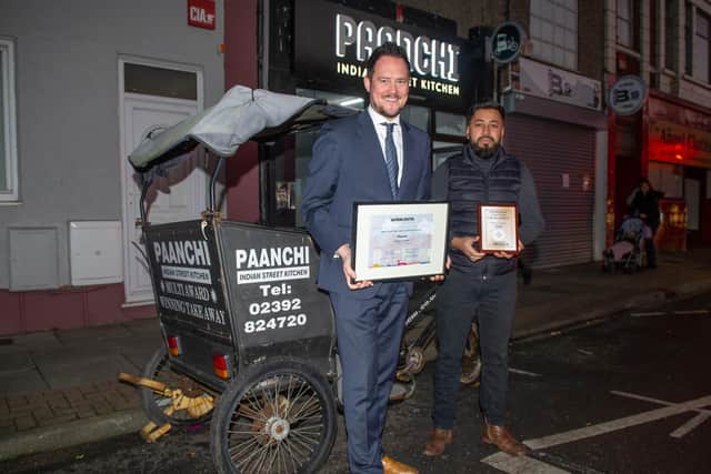 Stephen Morgan awarding Paanchi Indian Street Kitchen with a certificate after they have been nominated as the Portsmouth candidate for the Tiffin Cup. Picture: Habibur Rahman
