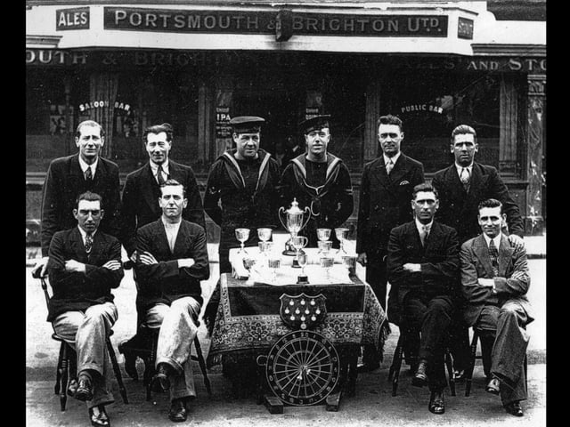 The triumphant Castle Tavern darts team from 1934-35