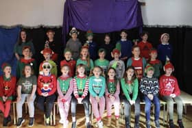 Year 5 pupils dressed in their elf outfits.