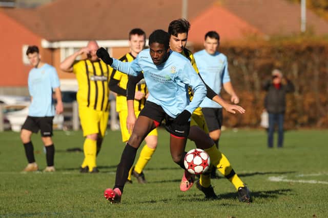 Co-Op Dragons (yellow/black) score against AFC Eastney. Picture: Kevin Shipp