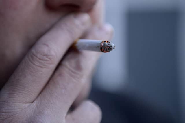 A man smoking a cigarette. Picture: Jonathan Brady/PA