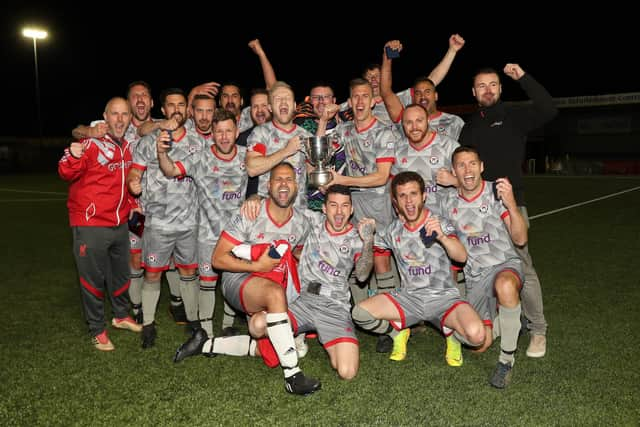 Gosham Rangers celebrate winning the Portsmouth & District FA Sunday Trophy final at Westleigh Park. Picture by Dave Haines