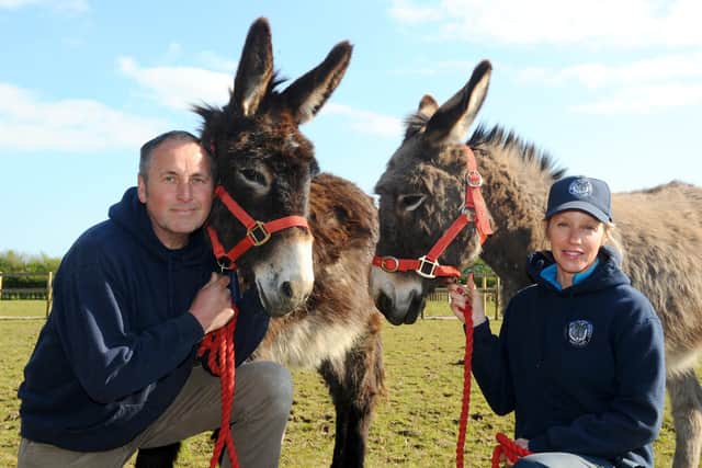 The Hayling Island Donkey Sanctuary is one of the many local animal sanctuaries that have been hit with a massive dent in their fundraising and may be forced to close. 
Pictured is: Tracey and Paul Hunt, owners of Hayling Island Donkey Sanctuary.
Picture: Sarah Standing (310320-7656)