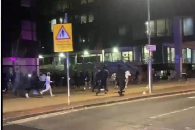This is the moment students were recorded fleeing police after a halls of residence party of more than 50 people continued out onto the street.

Picture taken from a video produced by The Sun newspaper.