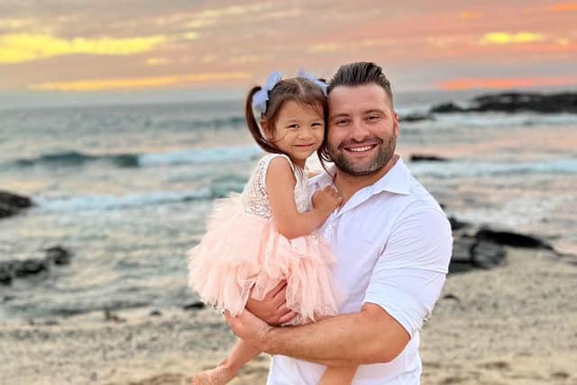 Former Pompey player John Sullivan has made a new life for himself in Las Vegas as a real estate agent. Pictured with daughter Maxwell