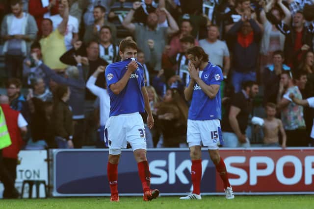 Adam Barton (far right) is dejected after Pompey's League Two play-off elimination at Plymouth in May 2016. Picture: Joe Pepler