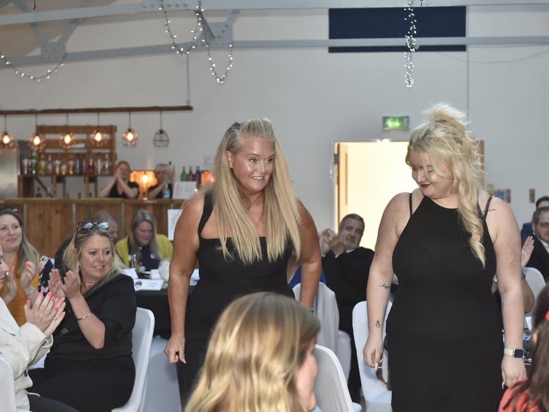 The Book Shop, Lee-on-the-Solent, go up to collect their award for Independent Retail Business of the Year.