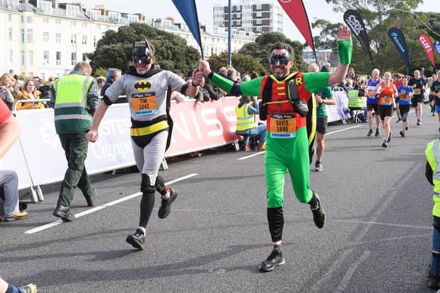 Batman and Robin, brothers Tim Morris and David Morris, cross the line

Picture: Keith Woodland (171021-0)