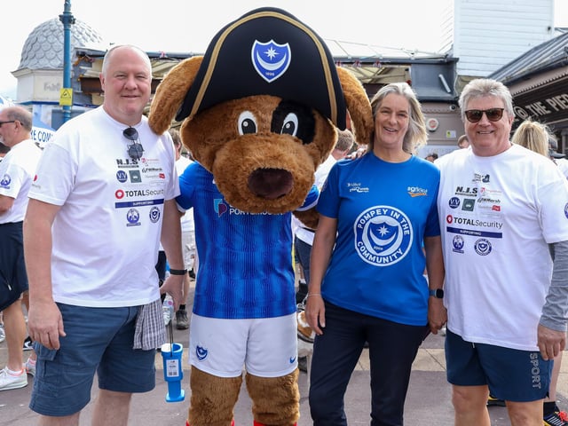 From left - Guy Butters, Pompey mascot Nelson, Clare Martin (CEO of Pompey in the Community, who will oversee the running of the John Jenkins Stadium) and Alan Biley at the Walk The Island event. Picture: Chris Moorhouse