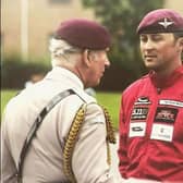 Pictured is: Sgt Dean Walton meeting then Prince Charles.