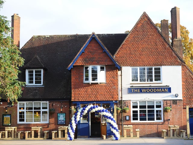 The Woodman has had brand new lighting and signage installed at the front of the pub Picture: Sarah Standing (151124-)