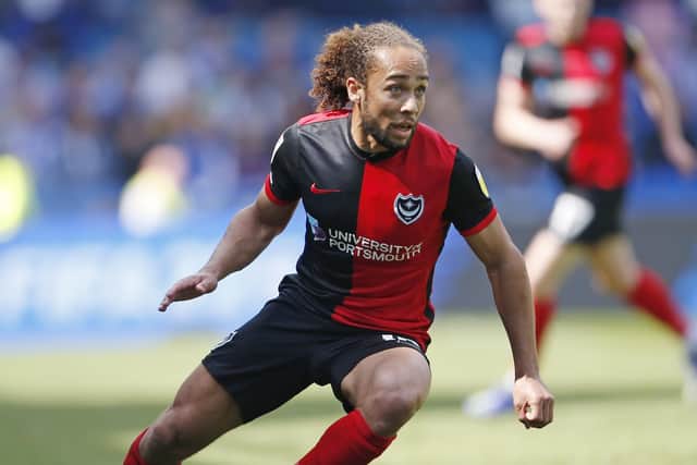 Pompey forward Marcus Harness has signed a new contract with the Blues