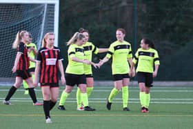 Beth Smith, second right, has just netted for US Portsmouth Women Picture: Neil Marshall