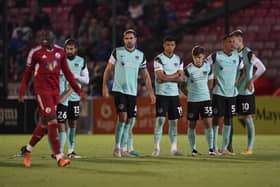 Pompey's players reflect on a penalty shoot-out defeat at Crawley having earlier finished 2-2 in the Papa John's Trophy tie. Picture: Jason Brown/ProSportsImages