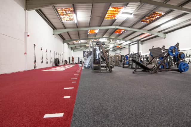 After serious flooding, the community at Basecamp gym in Hilsea came together to work an 18 hour shift to get the gym tidied upPictured: The Basecamp area where it was flooded. Pictured after all the work was done to itPicture: Habibur Rahman