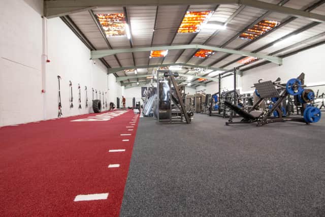 After serious flooding, the community at Basecamp gym in Hilsea came together to work an 18 hour shift to get the gym tidied up

Pictured: The Basecamp area where it was flooded. Pictured after all the work was done to it

Picture: Habibur Rahman