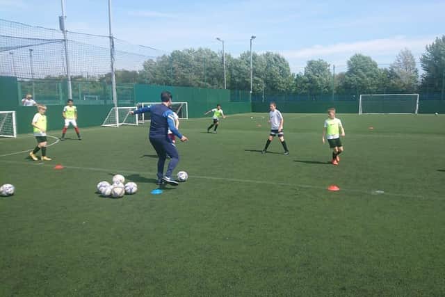 Danny Cowley put the Meon Junior School football team through their paces ahead of the Utilita Kids Cup Final at Wembley. Picture: Freddie Webb.